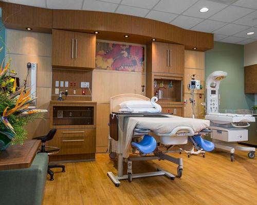 Interior view of labor, delivery, and recovery room at Jupiter Medical Center. Delivery bed and baby bed.